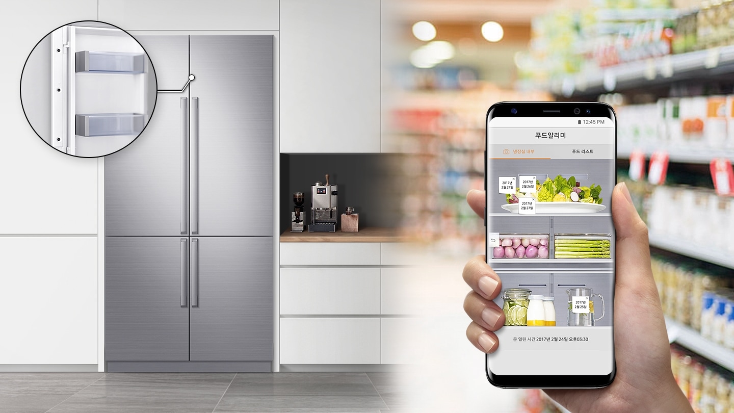 냉장고가 주방에 설치되어 있고, 스마트폰을 사용에 활용하는 모습입니다.
