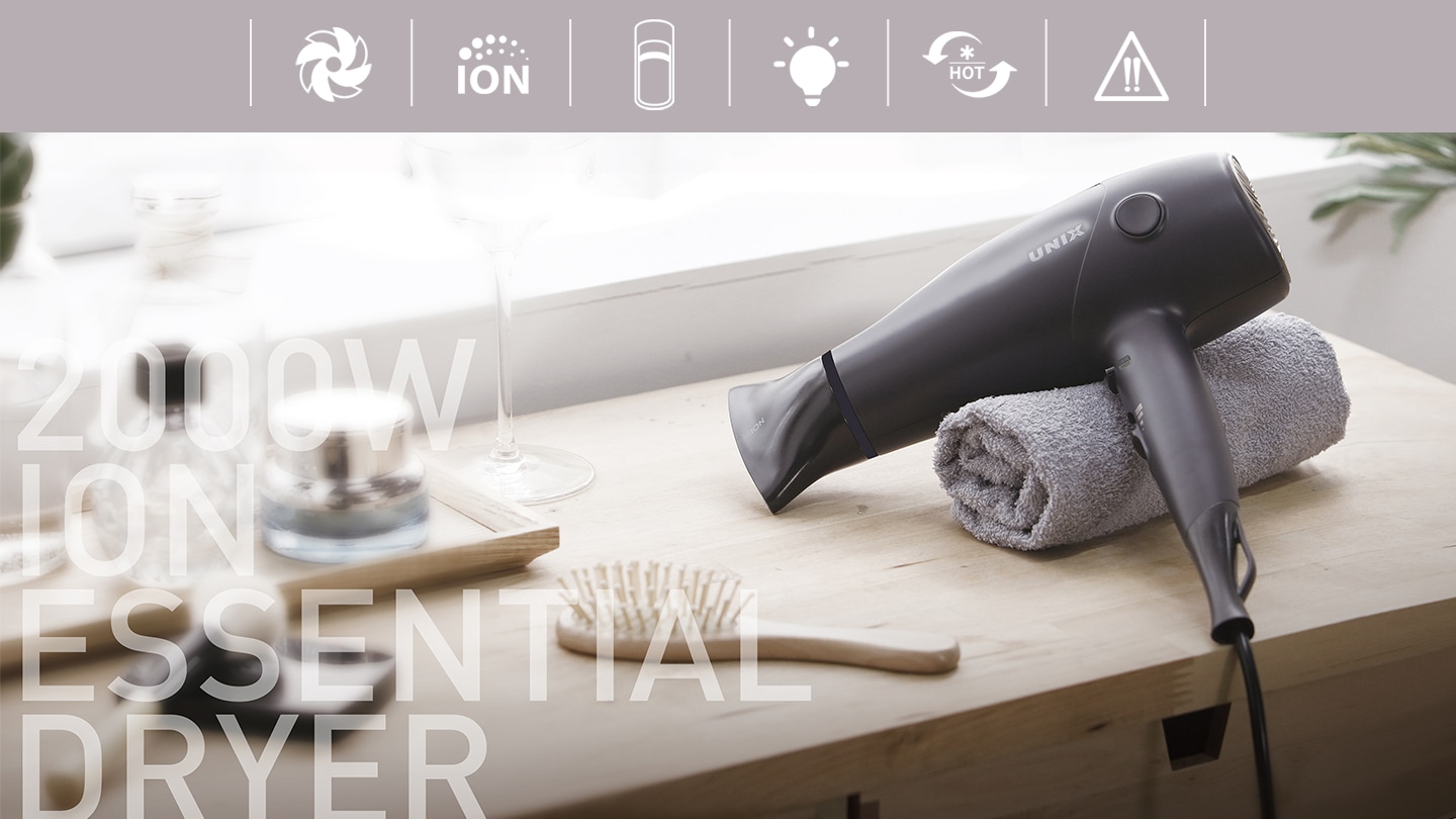 제품의 특징을 나타내는 6가지 아이콘과 테이블 위에 올려진 제품 뒷면이 보입니다. 이미지 앞으로는 2000W ION ESSENTIOAL DRYER 문구가 있습니다.