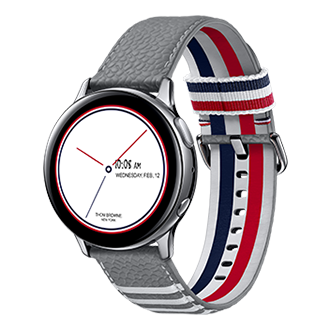 The Samsung Galaxy Watch Active2 Thom Browne Singapore in Grey (SM-F700FZAZXSP), displaying date, time, and a brand's name