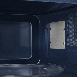 Close up of the interior of the Samsung Microwave Oven Solo with Home Dessert function 30L in black.