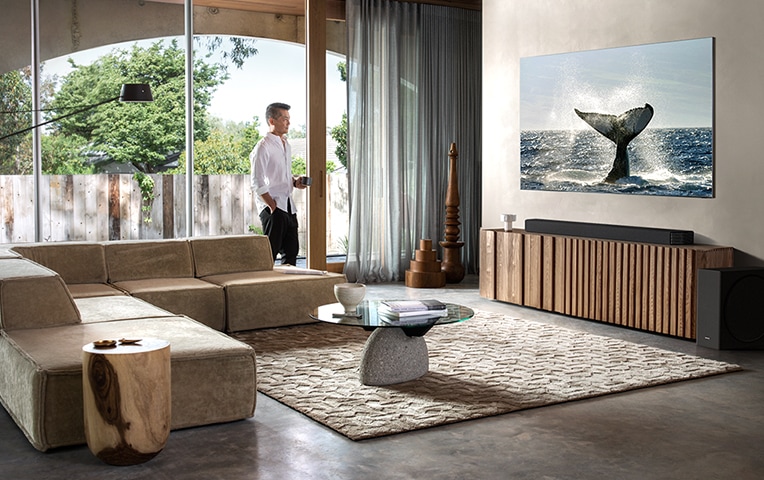 Soundbar set placed under a TV