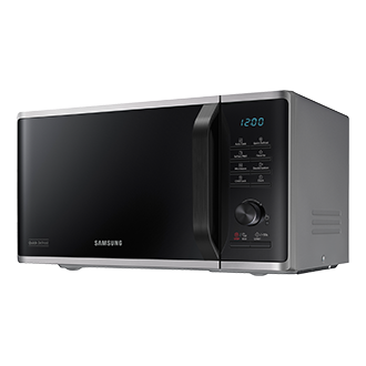 Front right view of a silver Samsung Solo Microwave oven with Quick Defrost
