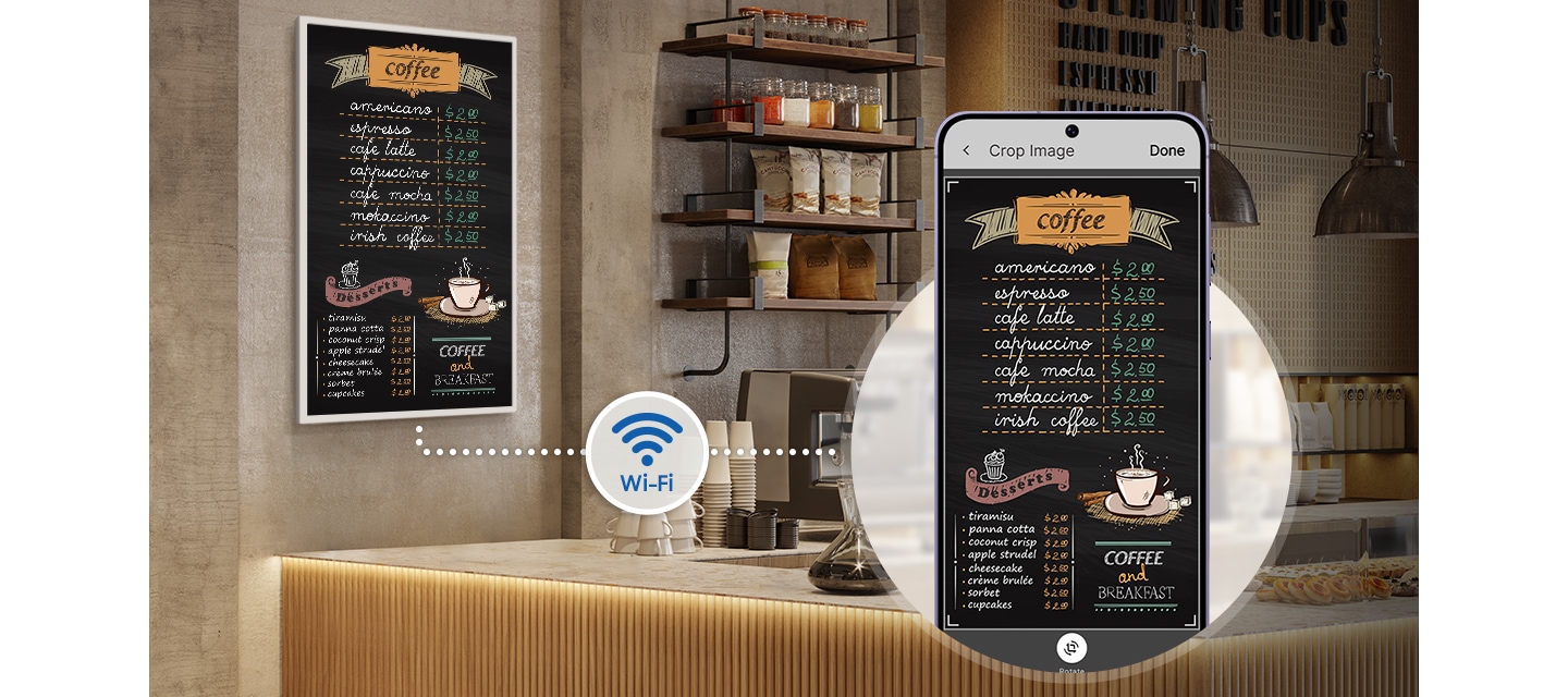 카페 벽면에 설치된 E-Paper와 동일한 화면을 디스플레이 중인 스마트폰의 모습니다. Wi-Fi를 통해 연결되어 있음을 표현하고 있습니다.