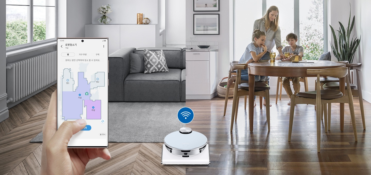 집 안에 제트 봇이 청소를 하고 있고 전용 앱의 스마트컨트롤 기능을 통해 제어하는 장면을 연출하였습니다.  화면 오른족에는 원형 테이블에 아이 둘과 여성 한 명이 자유롭게 시간을 보내고 있으며 왼쪽에는 앱 화면이 떠 있어 전용 앱을 사용하고 있습니다.