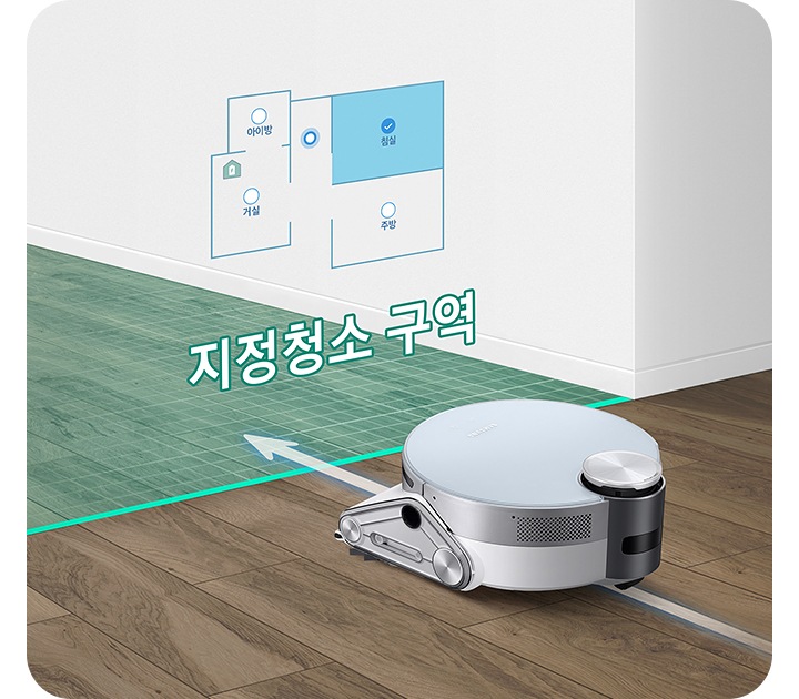 바닥을 청소하고 있는 제트 봇 앞에 초록색의 반투명한 벽이 있습니다. 벽에는 지정 청소 구역 기능의 이해를 돕기 위한 청소 영역을 표기한 맵이 표시되어 있습니다. 원하는 영역만 청소하는 지정청소 기능을 보여주는 장면입니다.