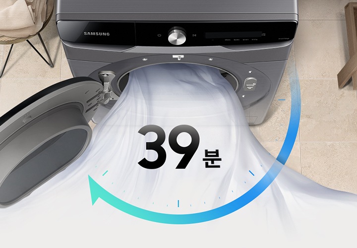 건조기 내부에서 흰색 천이 나오고 있습니다. 쾌속코스 기능을 활용하여 39분만에 건조 가능한 아이콘이 있습니다.