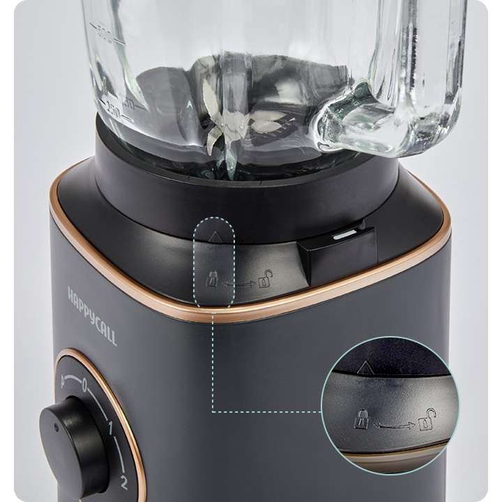 해피콜 블렌더 브리즈 베이직 측면 잠금장치 버튼이 확대된 이미지입니다.