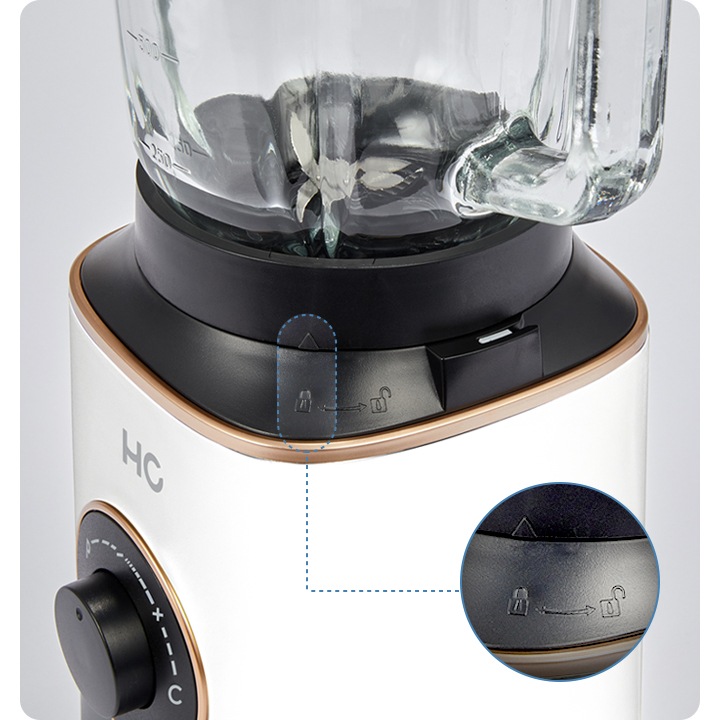 해피콜 블렌더 브리즈 베이직 플러스 모델 중간이 확대되어 있으며 잠금장치 버튼 부분이 확대되어 있습니다.