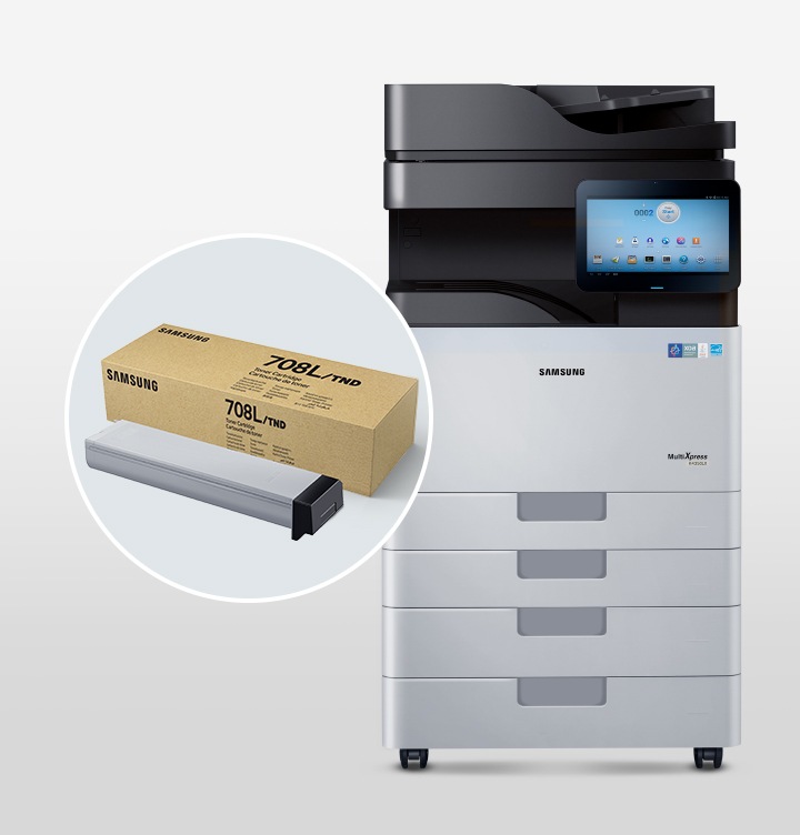 사무용 복합기 앞에 CLT-C804S/TND 마젠타 컬러 제품과, 상자가 놓여 있습니다.