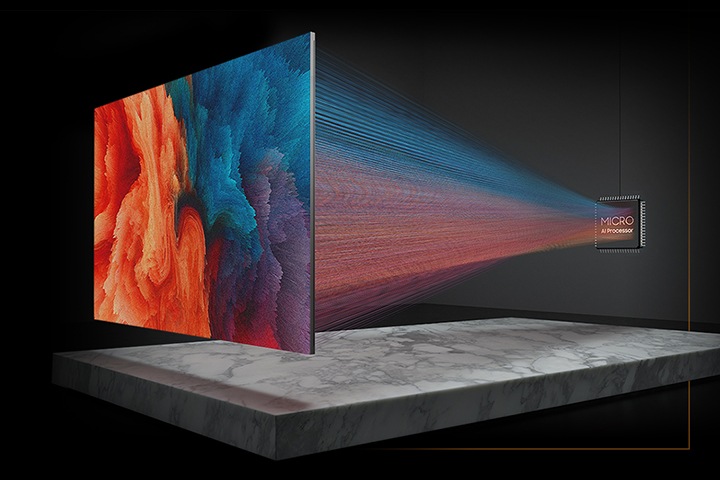 'MICRO AI Processor' 로고가 표시된 파워 프로세서 칩이 보이고, 칩에서 퍼져 나오는 빛이 MICRO TV와 연결되어 있습니다. 화면에는 빨강, 파랑, 보라색 그래픽이 예술 작품처럼 형상화되어 있습니다.