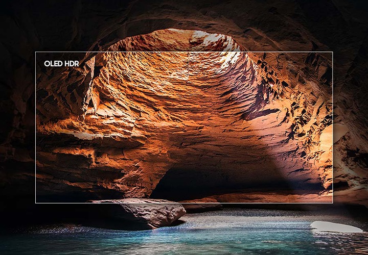 TV 정면이 보이며, 화면에는 계곡과 동굴이 보입니다.