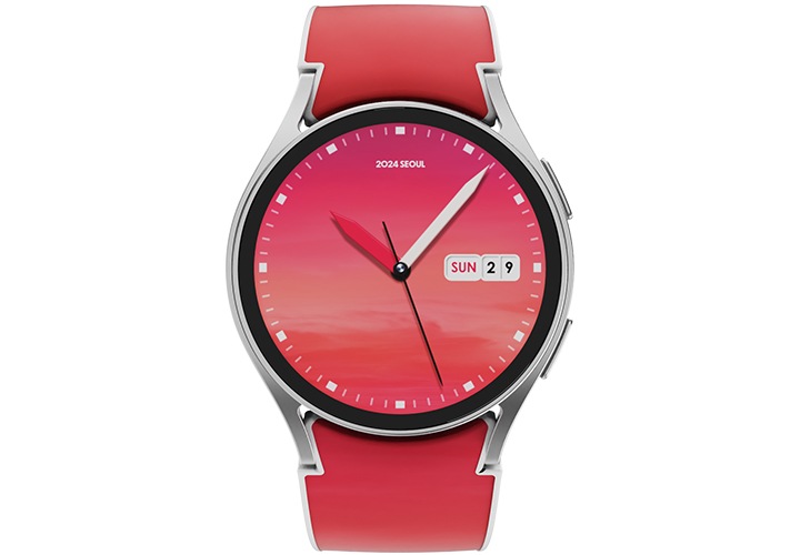 갤럭시 워치 스카이코랄 그라데이션 스트랩 (2024 서울색)을 단말에 장착하여 동그랗게 말은 후 단말의 화면을 보여주는 정면 이미지입니다. 화면에는 제공하고 있는 워치 페이스가 보이고 있습니다.