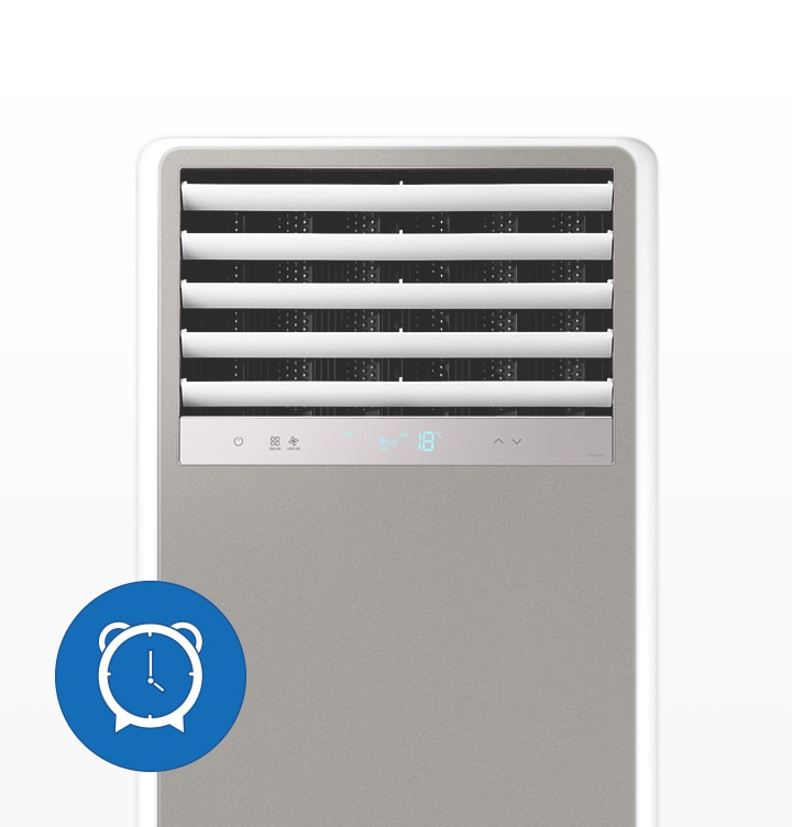 에어컨 정면 상단부가 보여지며, 전원이 작동중이며 좌측 아래에 시계모양의 아이콘이 보여집니다.