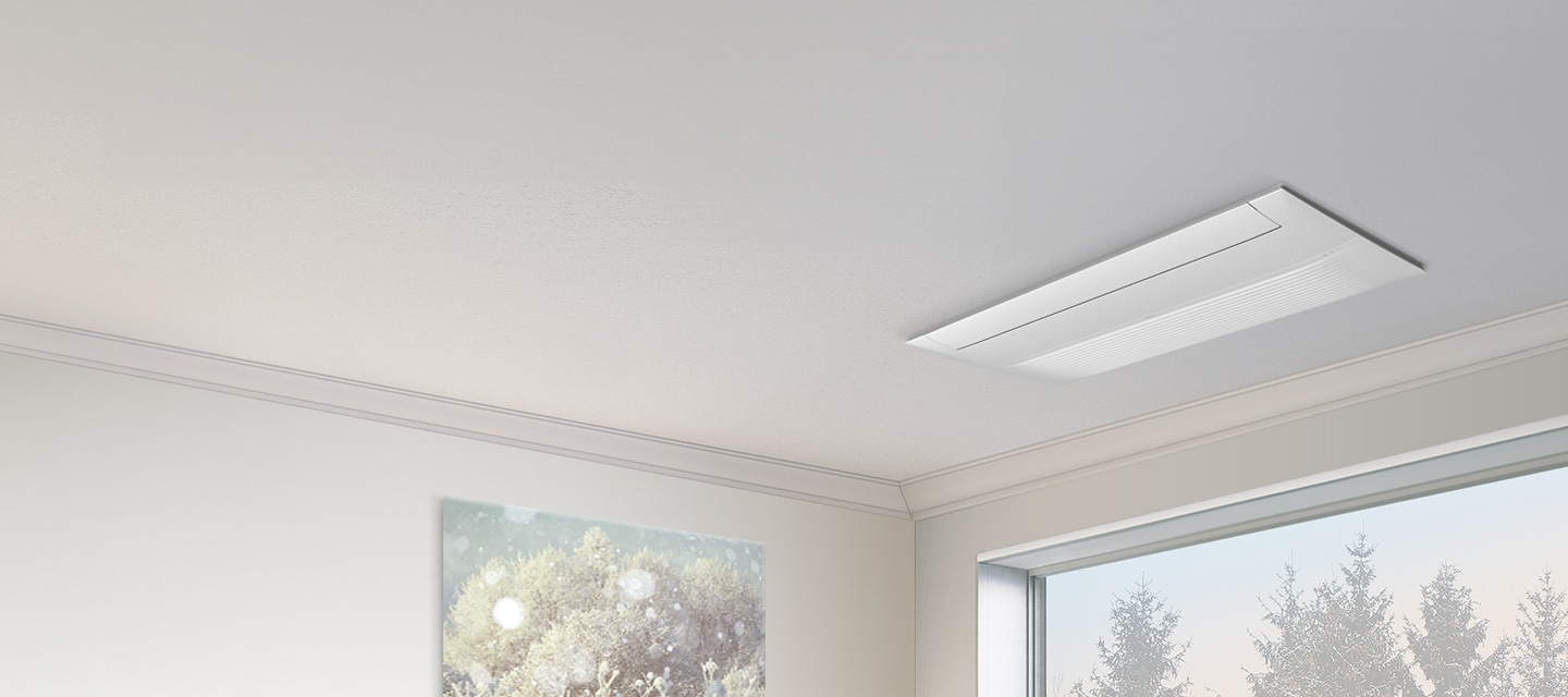 천장에 Infinite Line 무풍 시스템에어컨이 설치되어 있으며, 아래에는 겨울 풍경이 보이는 통 창과 추상화 그림이 조화를 이루는