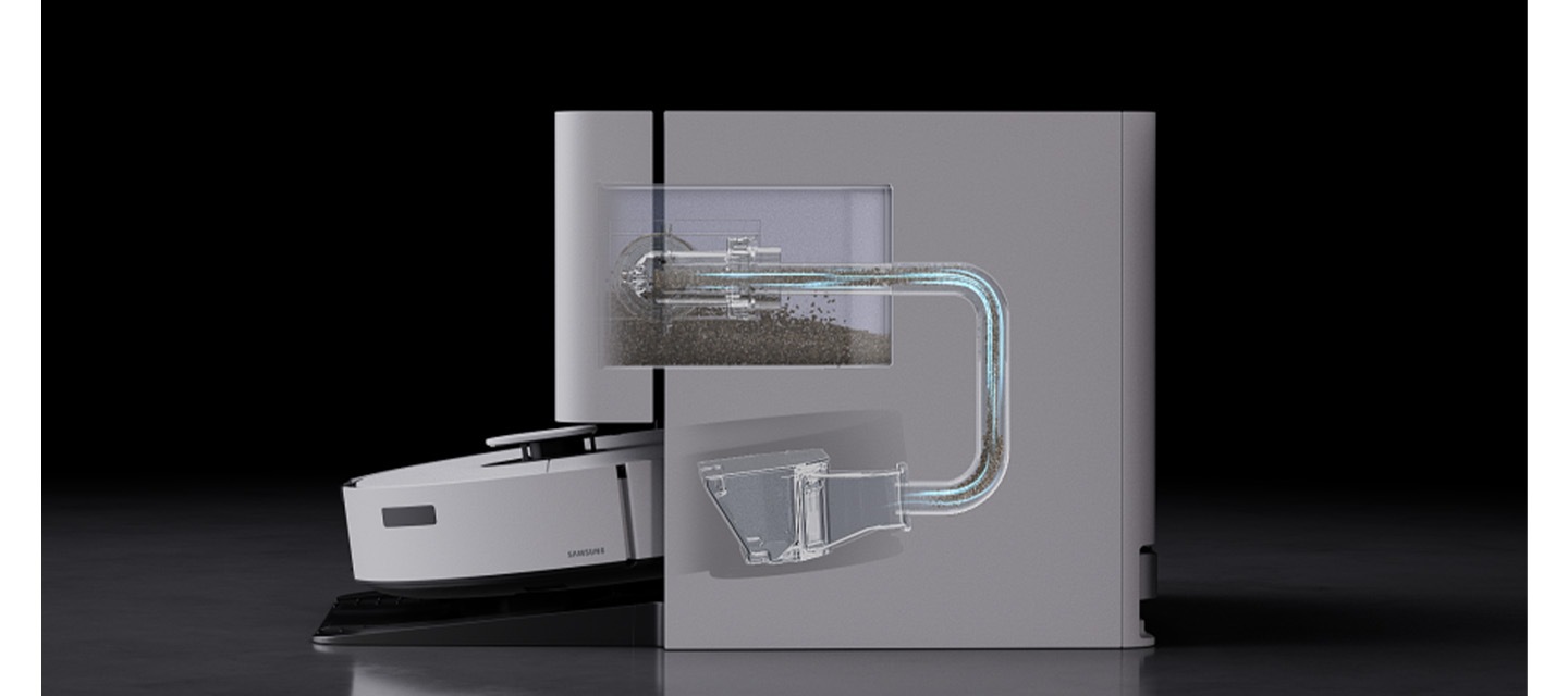 Bespoke AI 스팀 울트라 제품이 자동 급배수 청정스테이션과 함께 결합되어 있는 측면 모습이 있고, Bespoke AI 스팀 울트라의 먼지가 자동 급배수 청정스테이션 내부로 이동하는 모습을 제품 측면을 투영하여 알려주고 있습니다.