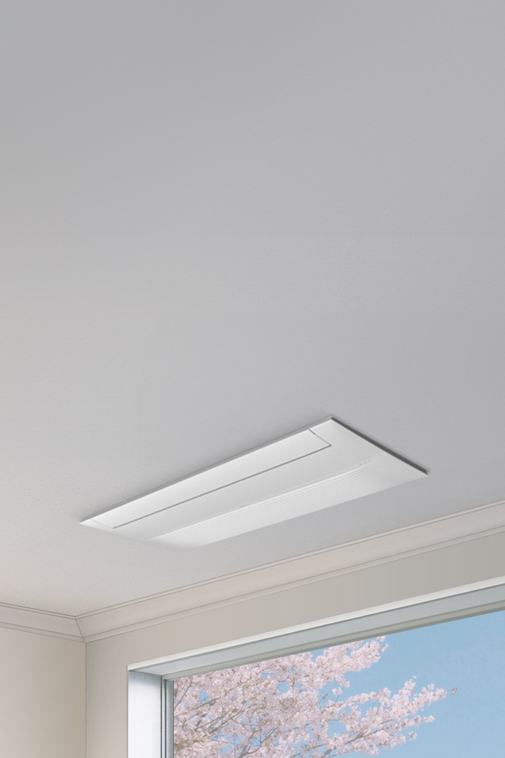 천장에 Infinite Line 무풍 시스템에어컨이 설치되어 있으며, 아래에는 봄 풍경이 보이는 통 창과 추상화 그림이 조화를 이루는