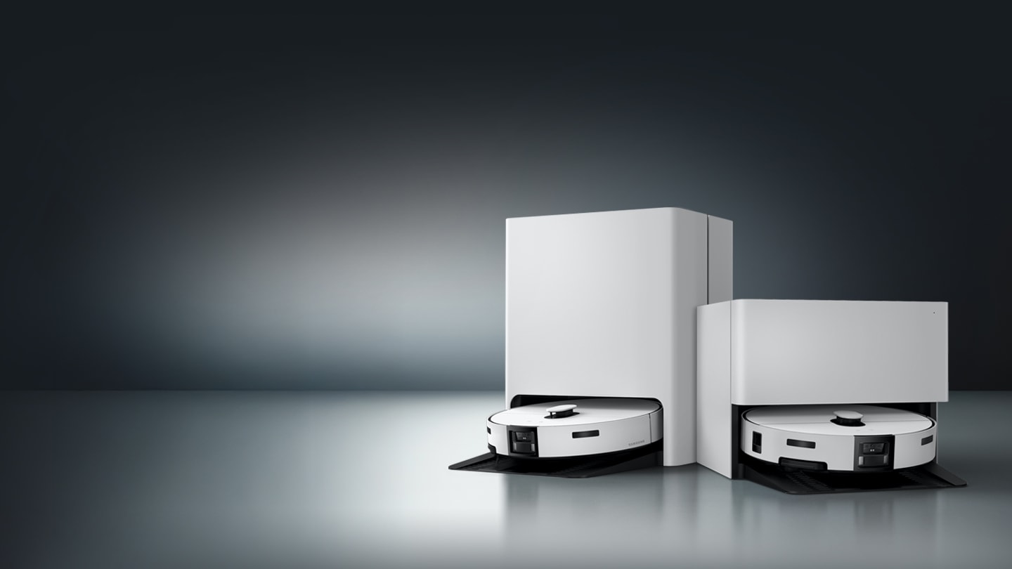 어두운 그라데이션 배경을 등지고 청정스테이션에 위치한 두 대의 Bespoke AI 스팀 이미지 클릭 시 스팀 구매하기 페이지로 이동한다.