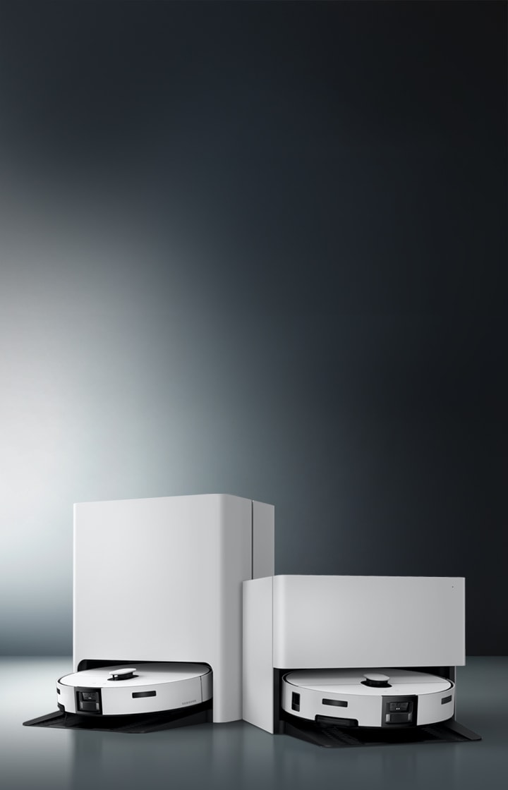 어두운 그라데이션 배경을 등지고 청정스테이션에 위치한 두 대의 Bespoke AI 스팀 이미지 클릭 시 스팀 구매하기 페이지로 이동한다.