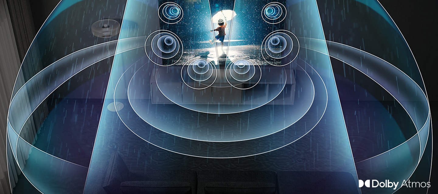 벽걸이 TV가 설치되어 있고, TV에서 나오는 음파들이 합성되어 있습니다. 우측 하단에는 돌비 앳모스 아이콘이 합성되어 있습니다.