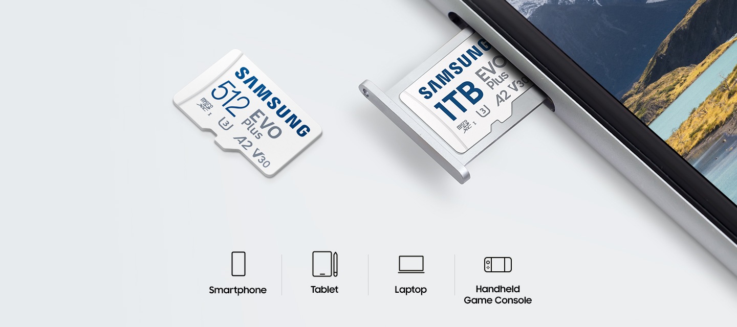 흰색 책상을 배경으로 이미지 왼쪽 부분에는 메모리카드가 태블릿에 삽입되는 이미지가 보이고 있고 이미지 왼쪽 부분에는 메모리카드 정면 이미지가 보이고 있습니다. 이미지 중간 하단 부분에는 스마트폰 아이콘과 Smartphone 텍스트, 태블릿 아이콘과 Tablet 텍스트, 노트북 아이콘과 Laptop 텍스트, 휴대용 게임 콘솔 아이콘과 Handheld Game Consle 텍스트가 나열되어 있습니다.