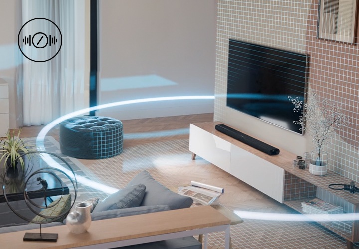 방안 장식장 위에 사운드바가 놓여 있습니다. 장식장 위에는 화병, 캔들, 카메라 놓여 있으며, 아래에는 책들이 놓여 있습니다. 방안에는 동그랗게 음향효과가 퍼져 나가고 있습니다.