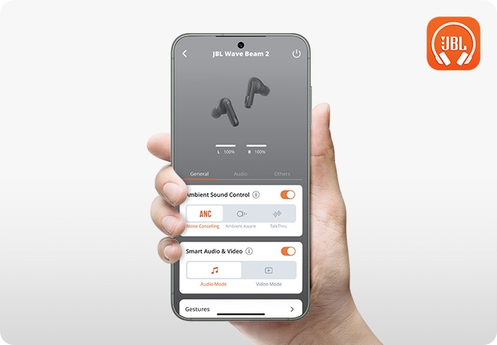 스마트폰에 JBL Headphones 앱 화면이 보입니다.