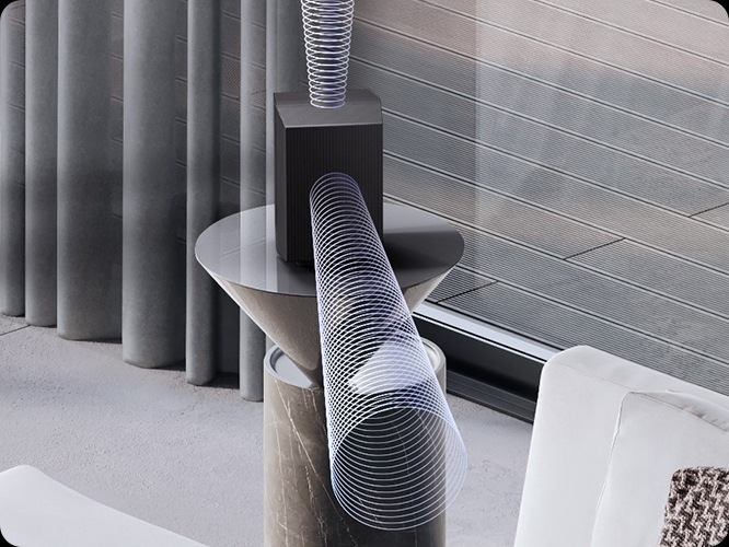 장식장 위에 무선 리어 스피커가 설치되어 있으며 음향효과가 나오고 있습니다.