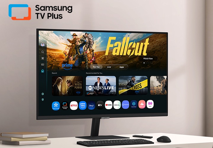 책상 위 모니터가 보입니다. 모니터 화면엔 여러 OTT 서비스를 나타내고 있습니다.