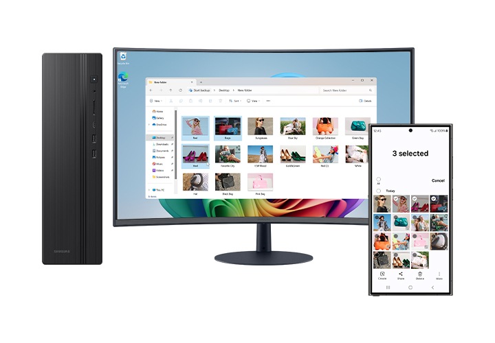 스마트폰과 모니터, 데스크탑이 나란히 놓여있습니다.