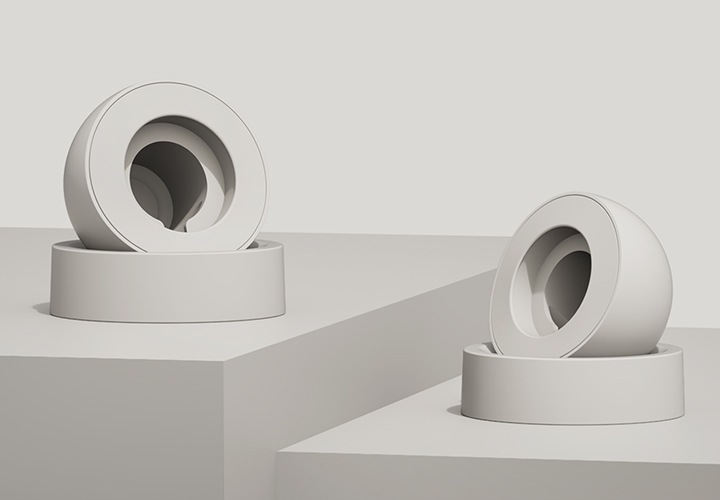 단차가 있는 조형물 위에 베이직 갤럭시 워치 충전독 거치대가 보이고 있습니다.