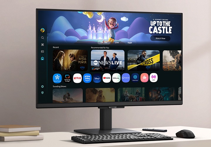 책상 위 모니터가 보입니다. 모니터 화면엔 여러 OTT 서비스를 나타내고 있습니다.