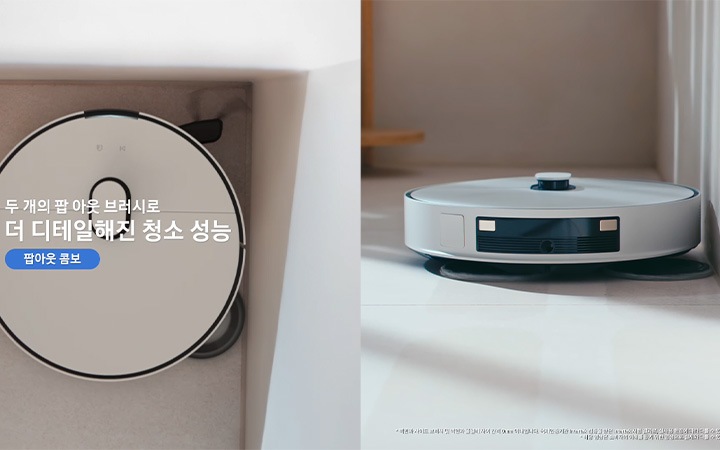 왼쪽 부분에 벽과 바닥이 만나는 모서리가 나오고 신경 쓰기 어려운 구석부터 벽면까지 스스로 감지 팝아웃 콤보 텍스트와 함께 Bespoke AI 스팀 울트라가 모서리에 접근하면서 청소를 진행하는 모습과 바닥에 사이드 브러시가 닿는 부분이 연한 빨간색으로 표시된 후 다음 장면으로 넘어가 텍스트가 팝아웃 물걸레로 완전히 밀착해 빈틈없고 깔끔하게로 변경됩니다. 화면은 Bespoke AI 스팀 울트라 하단의 물걸레가 모서리 부분 벽면에 밀착하여 빈틈이 없는 모습이 나오고 있으며 브러시가 벽면에 밀착된 순간을 Bespoke AI 스팀 울트라의 뒷면 모습과 함께 0.mm precision, No gaps 텍스트로 더 강조하고 있습니다. 물걸레가 벽면의 밀착하는 장면이 나오면서 물걸레의 이동 방향과 청소 부분을 연한 파란색으로 표시하여 팝아웃 되면 청소 부분이 변하는 것을 알려주고 있습니다. 이어서 다음 장면에는 영상의 텍스트가 오른쪽으로 이동 후 코너는 팝아웃 사이드 브러시로 먼지 남김 걱정 없이 깨끗하게 팝아웃 콤보로 변경되었고 Bespoke AI 스팀 울트라를 위에서 내려본 모습과 함께 모서리 코너 부분을 사이드 브러시가 팝아웃 되어 청소하는 모습을 제품을 투영하여 보여주고 있습니다. 이후에 물걸레로 청소하는 영상과 사이드 브러시로 청소하는 영상이 화면에서 동시에 나오고, 텍스트가 왼쪽으로 이동 후 두 개의 팝 아웃 브러시로 더 디테일해진 청소 성능로 수정되어 노출되며 영상은 마무리됩니다.