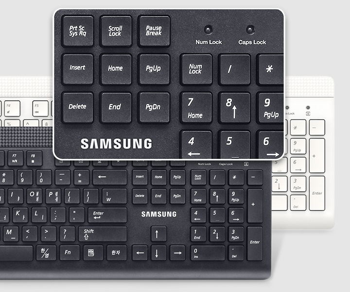 검은색 키보드와 흰색 키보드가 겹쳐져 있고 검은색 키보드의 키를 확대하여 보여줍니다.