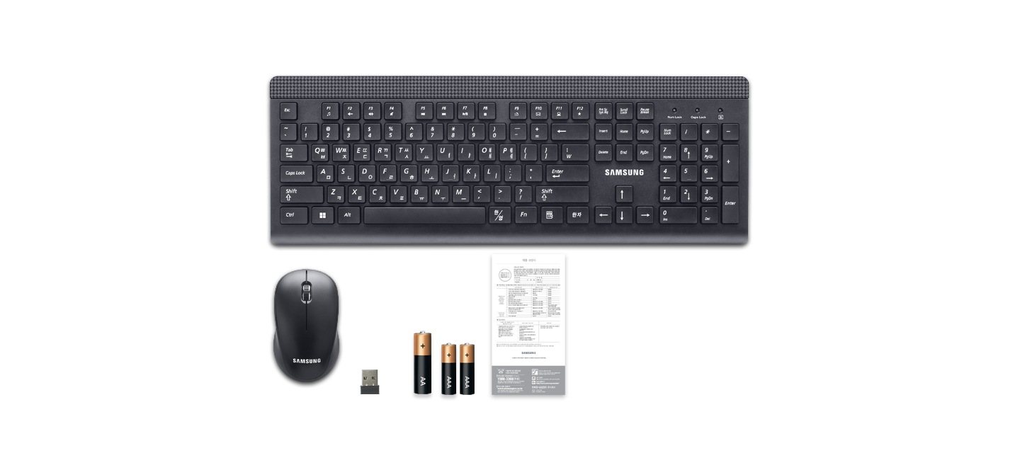 검은색 키보드의 정면 이미지가 보입니다 그 아래쪽에 순서대로 검은색 마우스와 리시버(수신기)이미지, AA 건전지 1개 이미지, AAA건전지 2개 이미지, 사용설명서 이미지 1개가 나열 되어 있습니다.