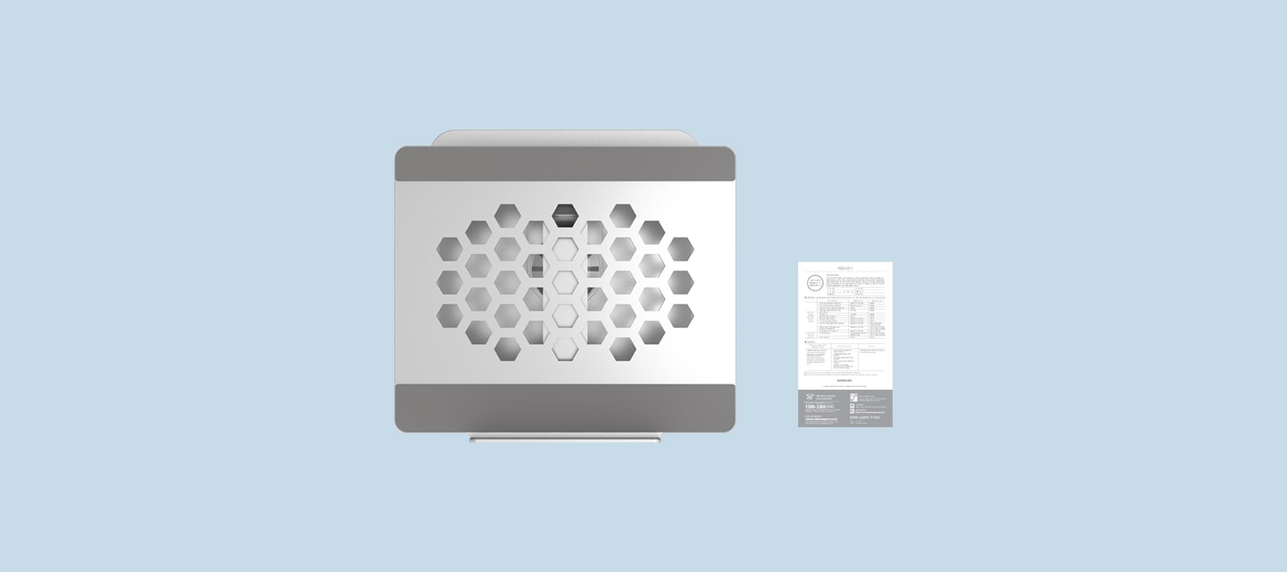 노트북 거치대의 상단 모습이 보이고 오른쪽엔 제품 보증서가 보입니다.