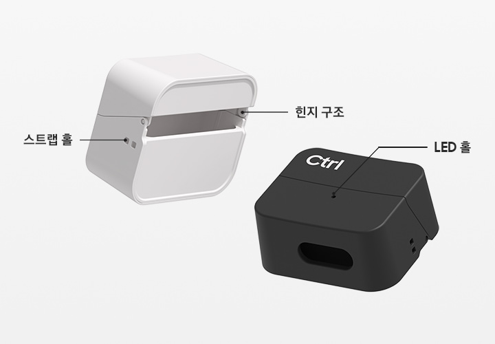 갤럭시 버즈3 FE 키캡 케이스 alt, ctrl 두 개가 보이고 있습니다. Alt 케이스는 뒷면이 보이고 있으며 힌지 구조와, 스트랩 홀을 자세히 보이고 있습니다. Ctrl 케이스는 좌측과 뒤쪽으로 살짝 틀어진 정면 이미지로 앞면의 LED 홀을 보이고 있습니다.