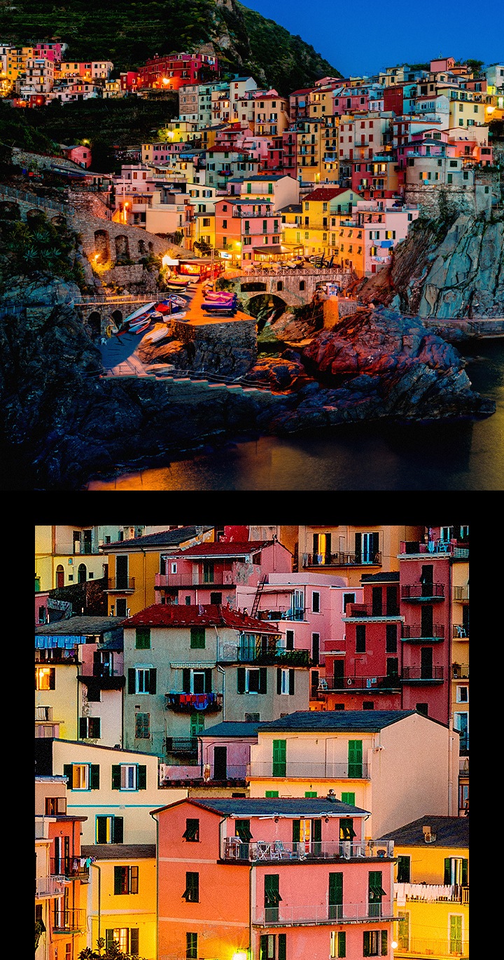 저녁에 언덕을 따라 늘어선 다채로운 집들의 사진입니다. 사진은 갤럭시 Z 트라이폴드의 2억 화소 후면 광각 카메라로 촬영되었습니다. 사진을 가까이 클로즈업한 장면에서 생생한 색상과 선명한 디테일을 확인할 수 있습니다.