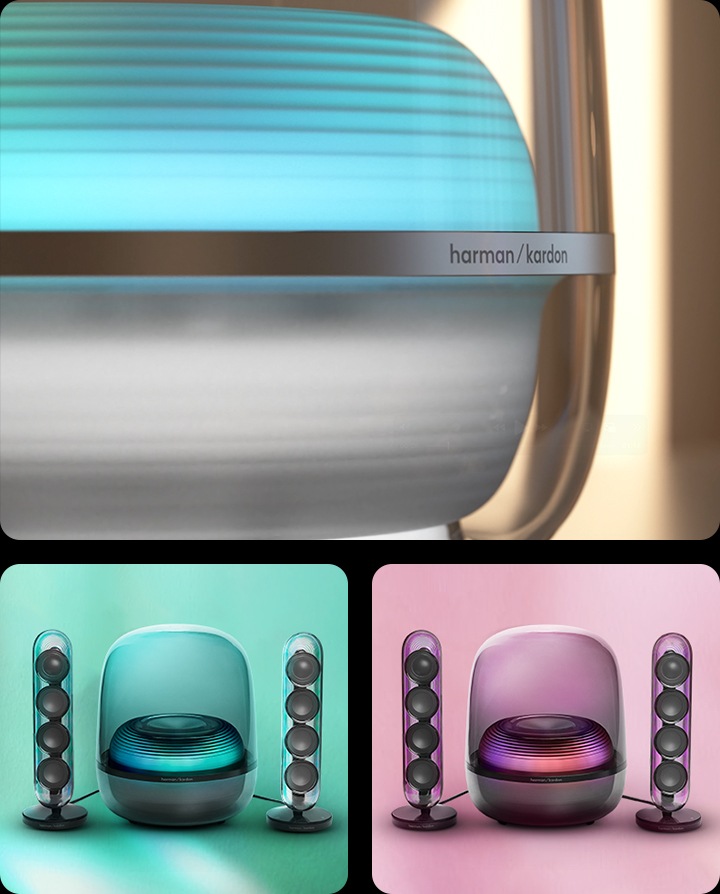 왼쪽에는 장식장 위에 흰색 스피커가 놓여 있으며, 스피커에는 분홍색 조명이 켜져 있습니다. 장식장에는 책들이 꽂혀 있습니다. 오른쪽 상단에는 초록색 배경에 검정색 스피커가 놓여 있으며, 스피커에는 녹색 조명이 켜져 있습니다. 오른쪽 하단에는 분홍색 배경에 검정색 스피커가 놓여 있으며, 스피커에는 분홍색 조명이 켜져 있습니다.