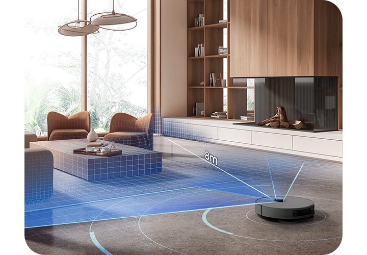 어두운 회색 바닥과 우드톤의 거실을 배경으로 이미지 왼쪽 부분에는 우드로 제작된 동그랗고 높은 사이드 테이블이 놓여 있고 테이블 위에는 책 2권이 올려져 있으며 그 옆으로 소파의 옆모습이 노출되고 있습니다. 소파 앞에는 우드로 제작된 테이블이 놓여 있고 테이블 위에는 도자기 장식과 우드 쟁반 위에 컵이 놓여 있습니다. 캬라멜 색상의 1인용 소파 2개가 테이블 주위로 배치되어 있으며, 왼쪽에 있는 1인용 소파 뒤에는 큰 거실 창이 있고 오른쪽 부분에 있는 1인용 소파의 뒤에는 TV와 책이 조금 꽂혀 있는 책장이 있으며, 이미지 오른쪽 하단 부분에 Bespoke AI 스팀 플러스의 뒷모습과 함께 dToF LIDAR 주행 센서를 사용하여 최대 8m 이내의 물체를 감지하는 모습을 알려주는 이미지가 있습니다. dToF LIDAR 주행 센서에서 파란색 빛이 나가는 모습과  빛 위에 8m 텍스트가 쓰여 있으며 스팀 주위로 연한 파란색 동그라미가 있습니다.