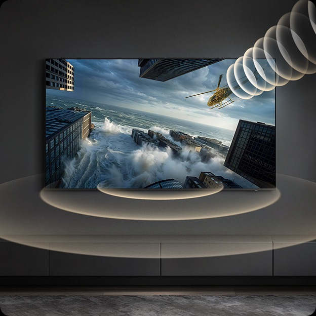 벽에 TV가 설치되어 있습니다. TV 화면에는 우주전쟁 영화의 한 장면이 보이며, TV에서 음향효과가 나옵니다