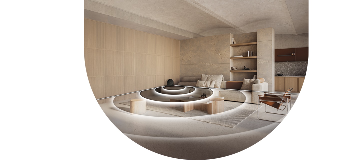 거실 안쪽에 스피커가 놓여 있습니다. 스피커에서는 음향효과가 나오며, 음향효과가 거실 전체로 퍼져 나가고 있습니다.