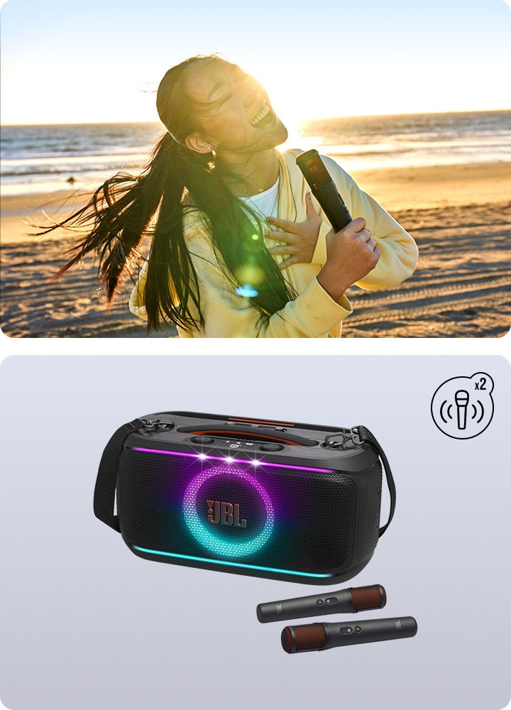 바닷가에서 마이크를 들고 노래를 부르는 여성의 연출된 이미지 입니다. JBL PARTYBOX ON-THE-GO2 PLUS 제품이미지 앞에 마이크 두개가 놓여있고 우측 상단에 마이크와 X2 아이콘이 있습니다.