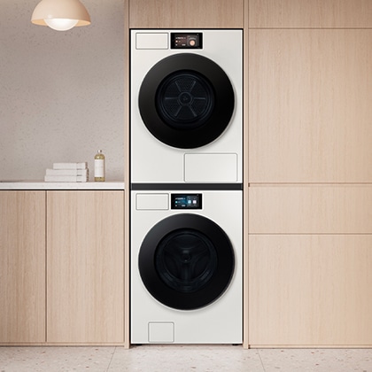 [세탁실에 Bésp~óké Á~Í 세탁기와 Bés~póké~ ÁÍ 건조기가 직렬 설치되어 있습니다.]