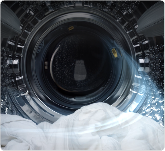 세탁기 문이 열려있고 바람이 들어오는 세탁기 안의 모습