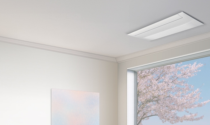 천장에 Infinite Line 무풍 시스템에어컨이 설치되어 있으며, 아래에는 봄 풍경이 보이는 통창과 추상화 그림이 조화를 이루는