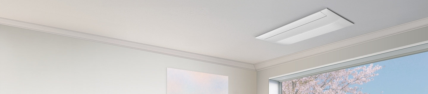 천장에 Infinite Line 무풍 시스템에어컨이 설치되어 있으며, 아래에는 봄 풍경이 보이는 통창과 추상화 그림이 조화를 이루는