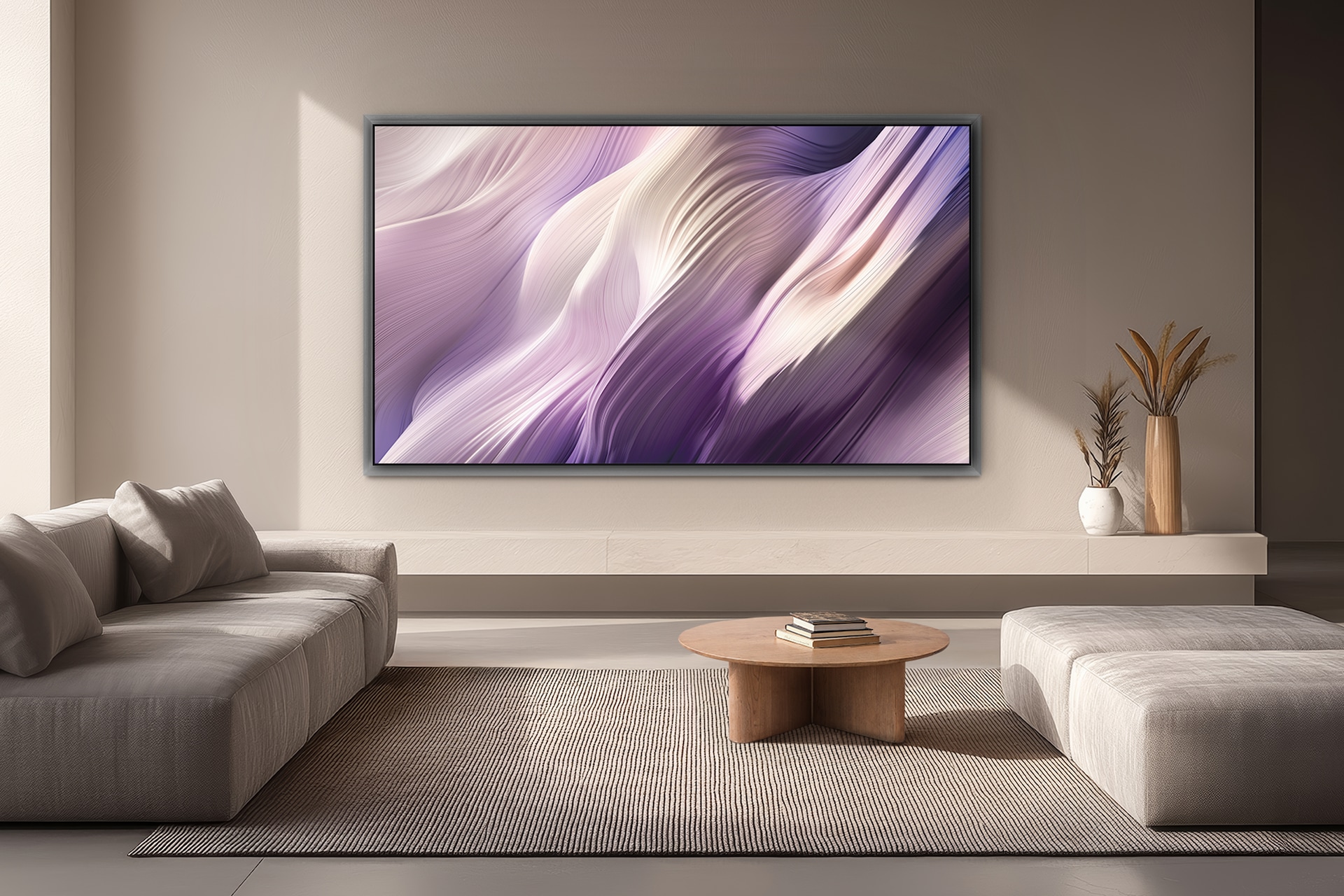 거실 벽에 TV가 설치되어 있습니다. TV 하단에는 화분들이 놓여 있습니다. TV 앞에는 책들이 올려진 테이블과 소파들이 있습니다.