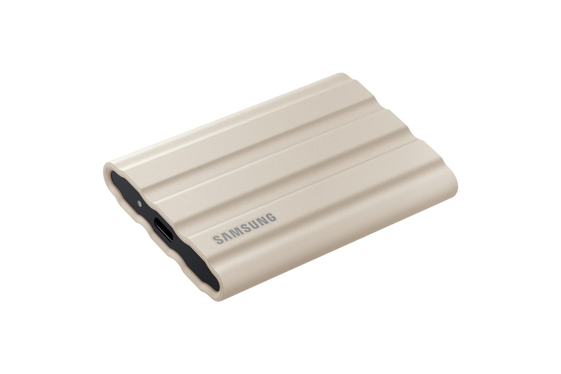 외장 SSD T7 Shield USB 3.2 Gen 2 2 TB (베이지) 제품 눕혀져 있는 모습 뒷쪽 45도에서 바라본 이미지