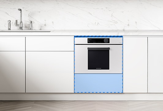 주방의 싱크대 하부장 안에 Bespoke 콤팩트 오븐을 설치한 모습입니다.