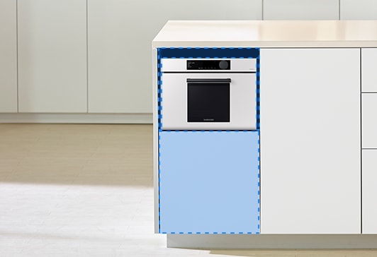 주방의 박스장 안에 Bespoke 콤팩트 오븐을 설치한 모습입니다.